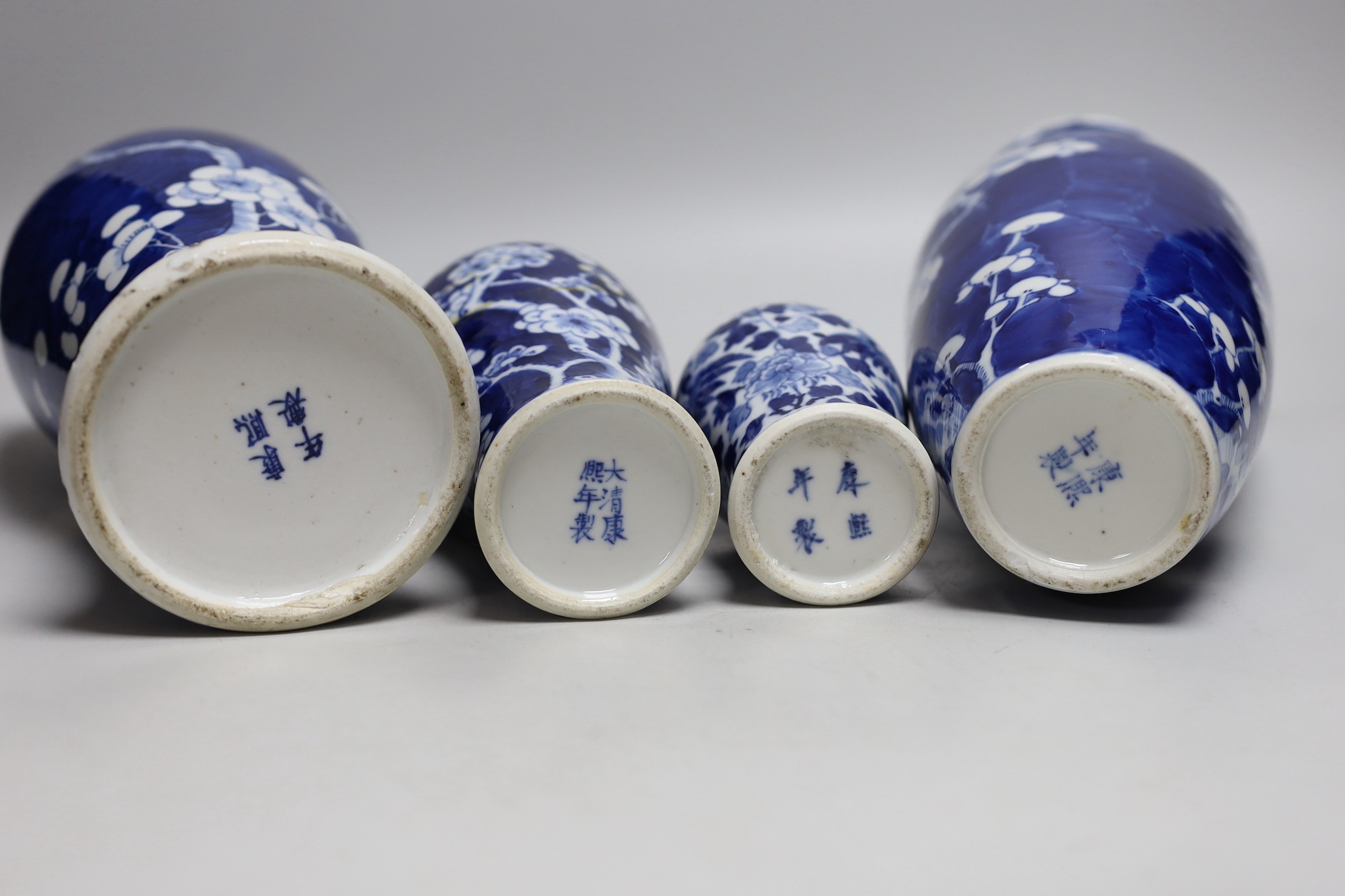 A Chinese prunus baluster jar and cover and three others, similar, tallest 30cms high